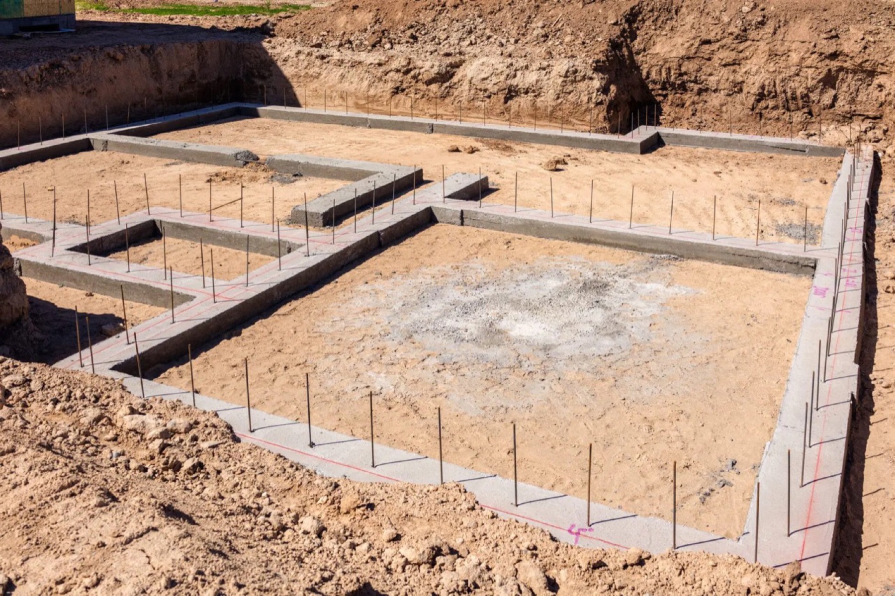 Concrete footings laid out for a foundation