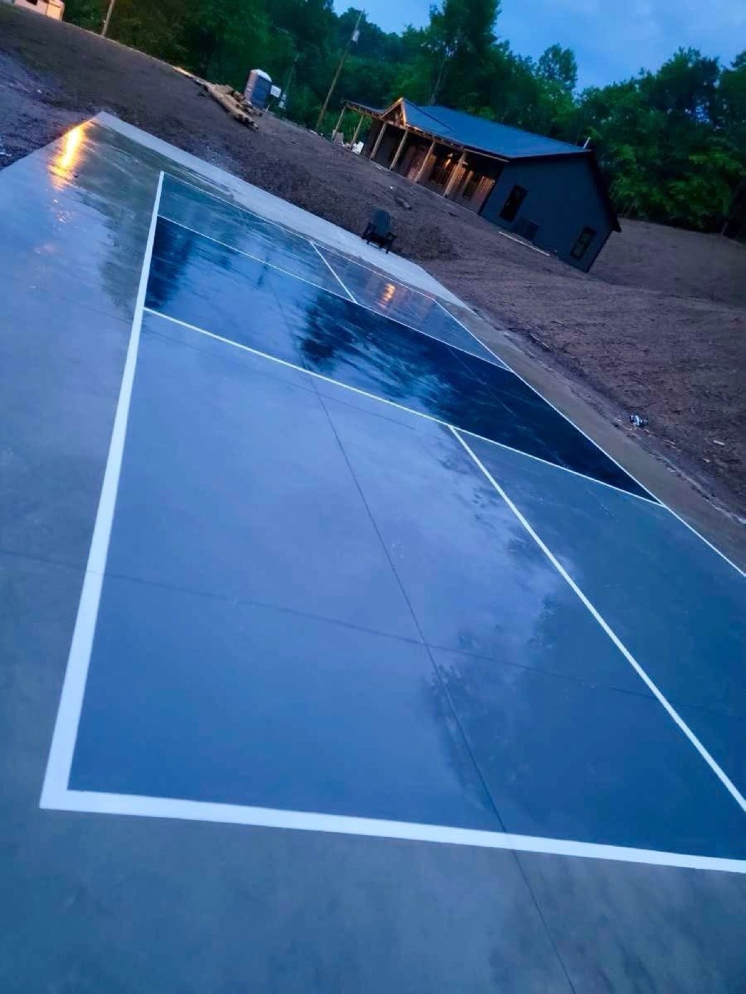 Backyard sport court with crisp painted lines